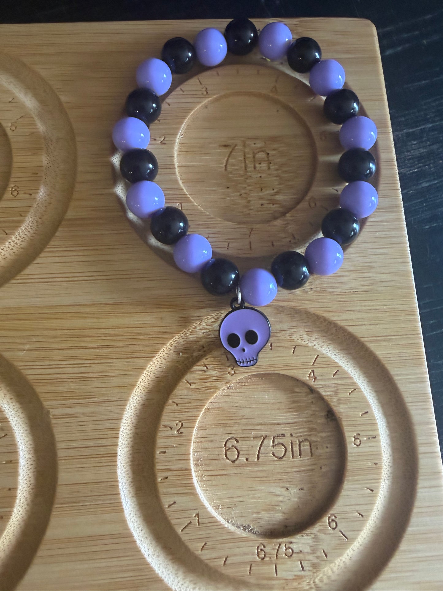 Black and Purple Halloween stretchy bracelet with skull charm