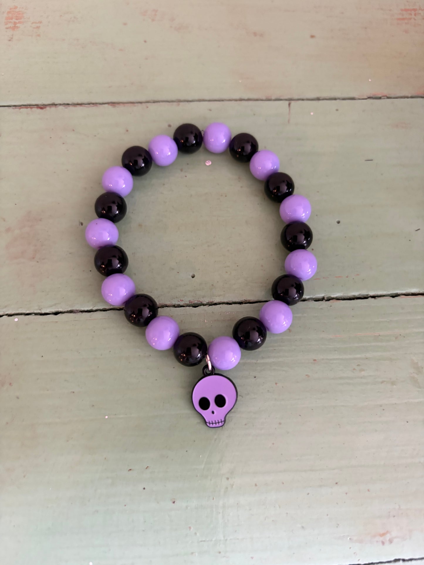 Black and Purple Halloween stretchy bracelet with skull charm