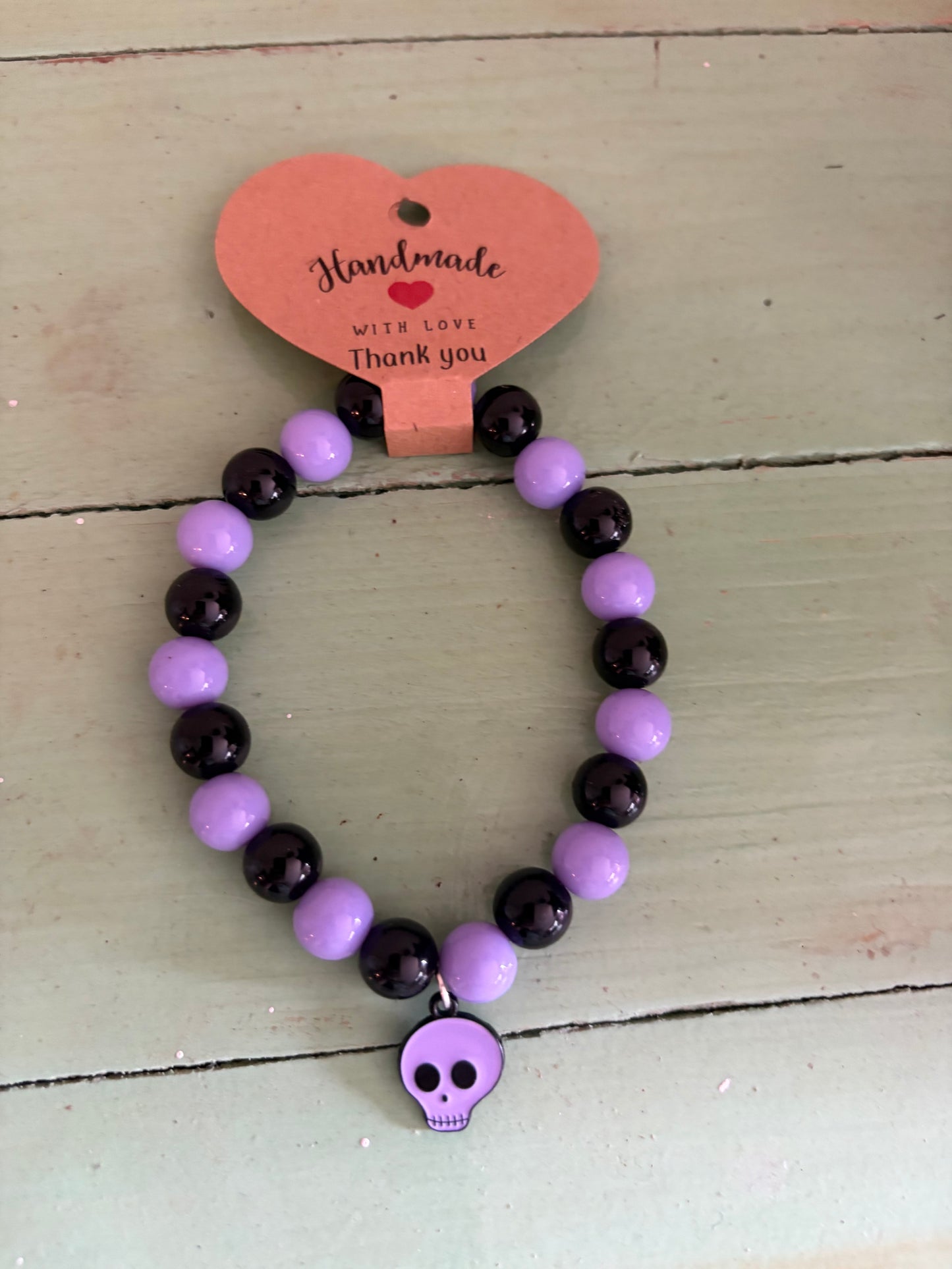 Black and Purple Halloween stretchy bracelet with skull charm